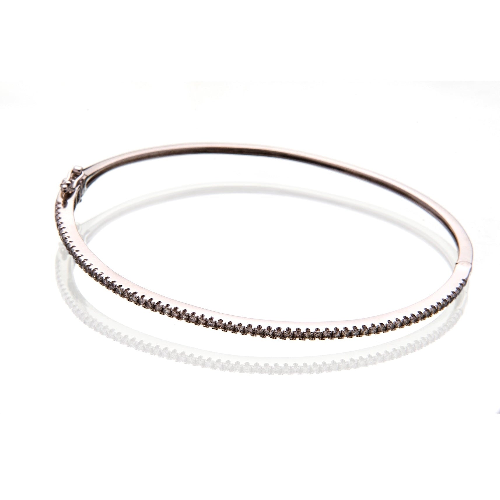 white gold and diamond bracelet by 11th house jewelry