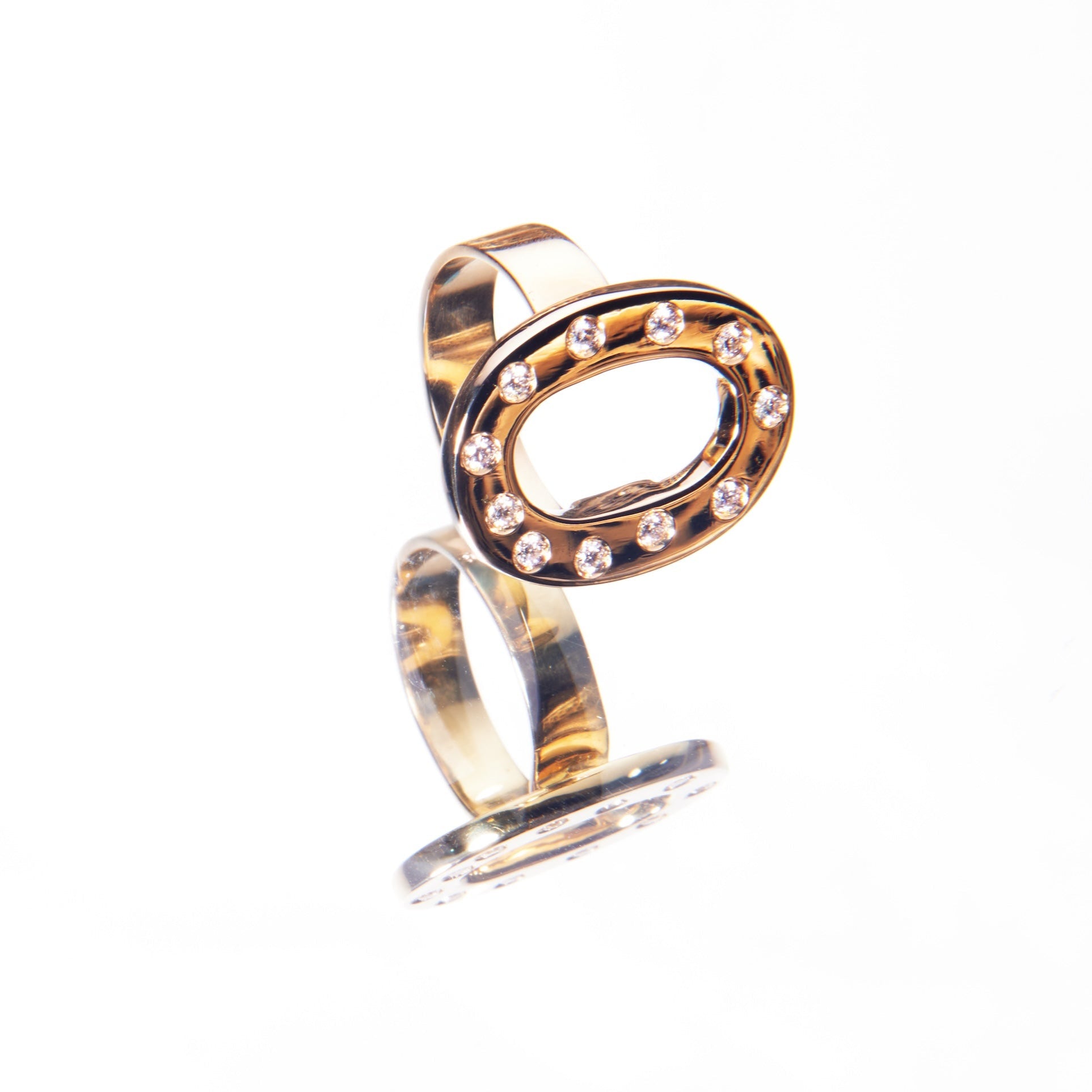 gold and diamond ring in a celestial pattern by 11th house