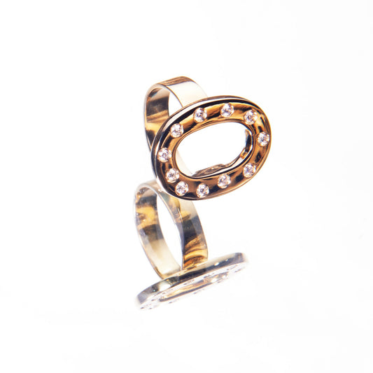 gold and diamond ring in a celestial pattern by 11th house