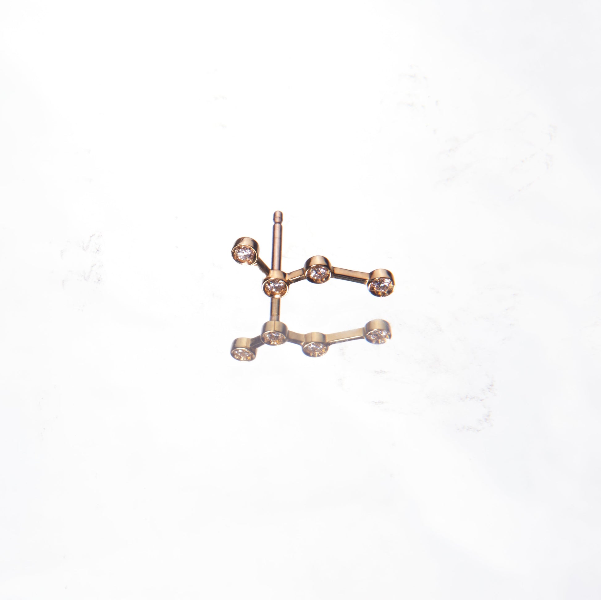 18K yellow gold and diamonds earrings in the shape of a constellation by 11th house. Made in Italy