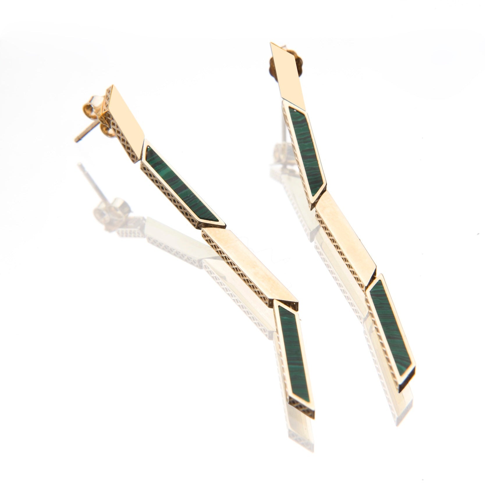 14K yellow gold and Malachite these earrings are designed by 11th house and make a stunning statement.