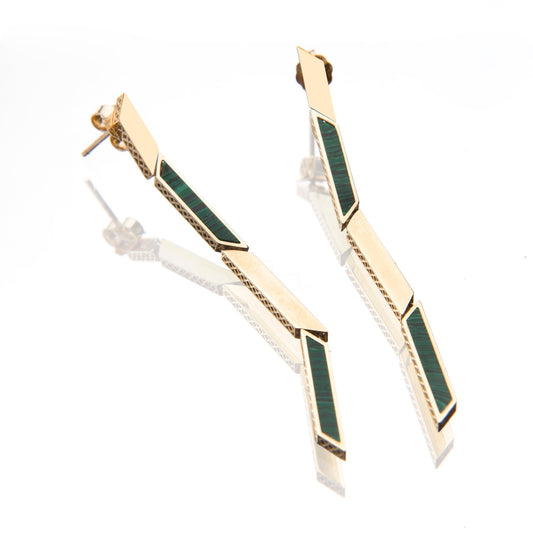 14K yellow gold and Malachite these earrings are designed by 11th house and make a stunning statement.