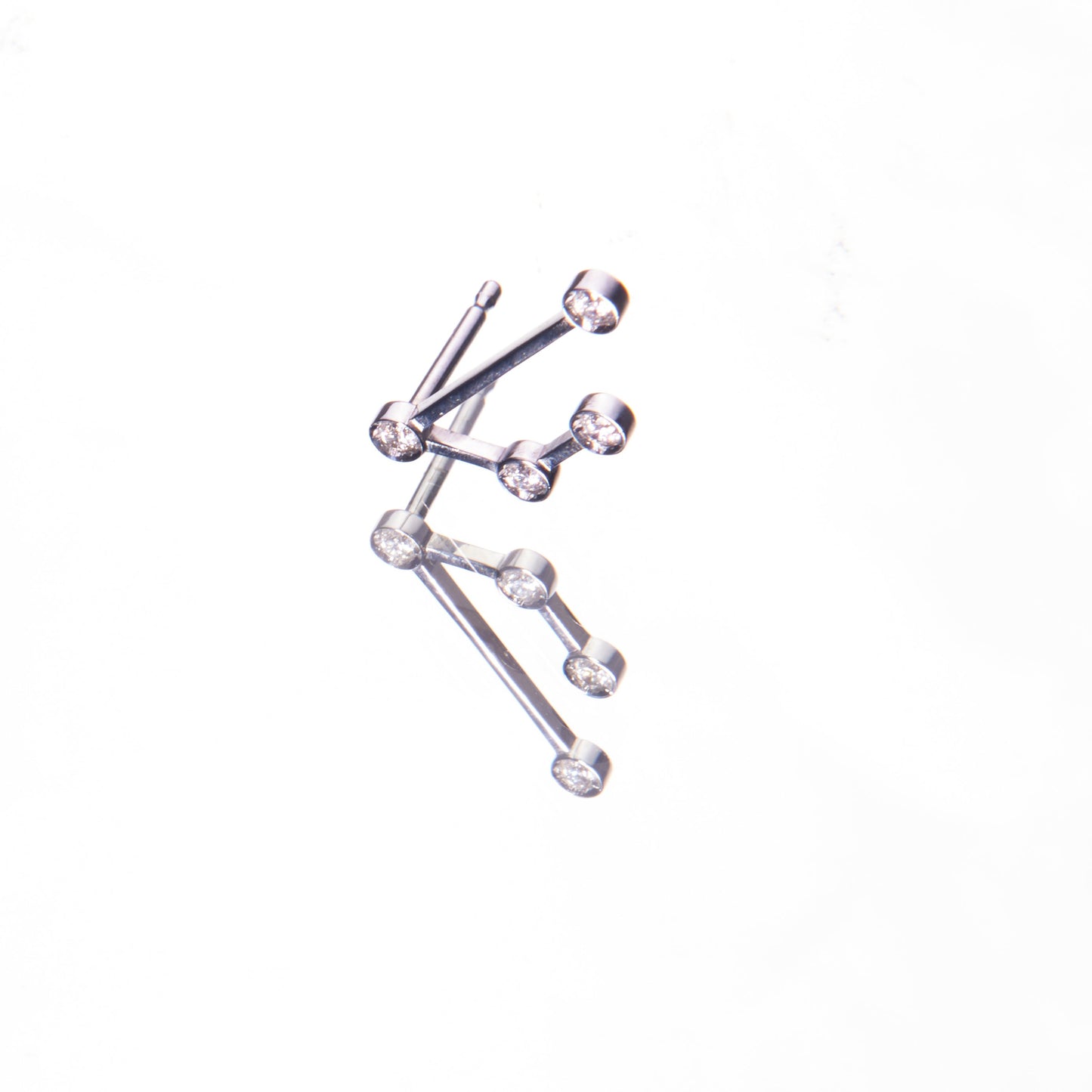 18K white gold and diamonds earrings in the shape of a constellation. Made in Italy