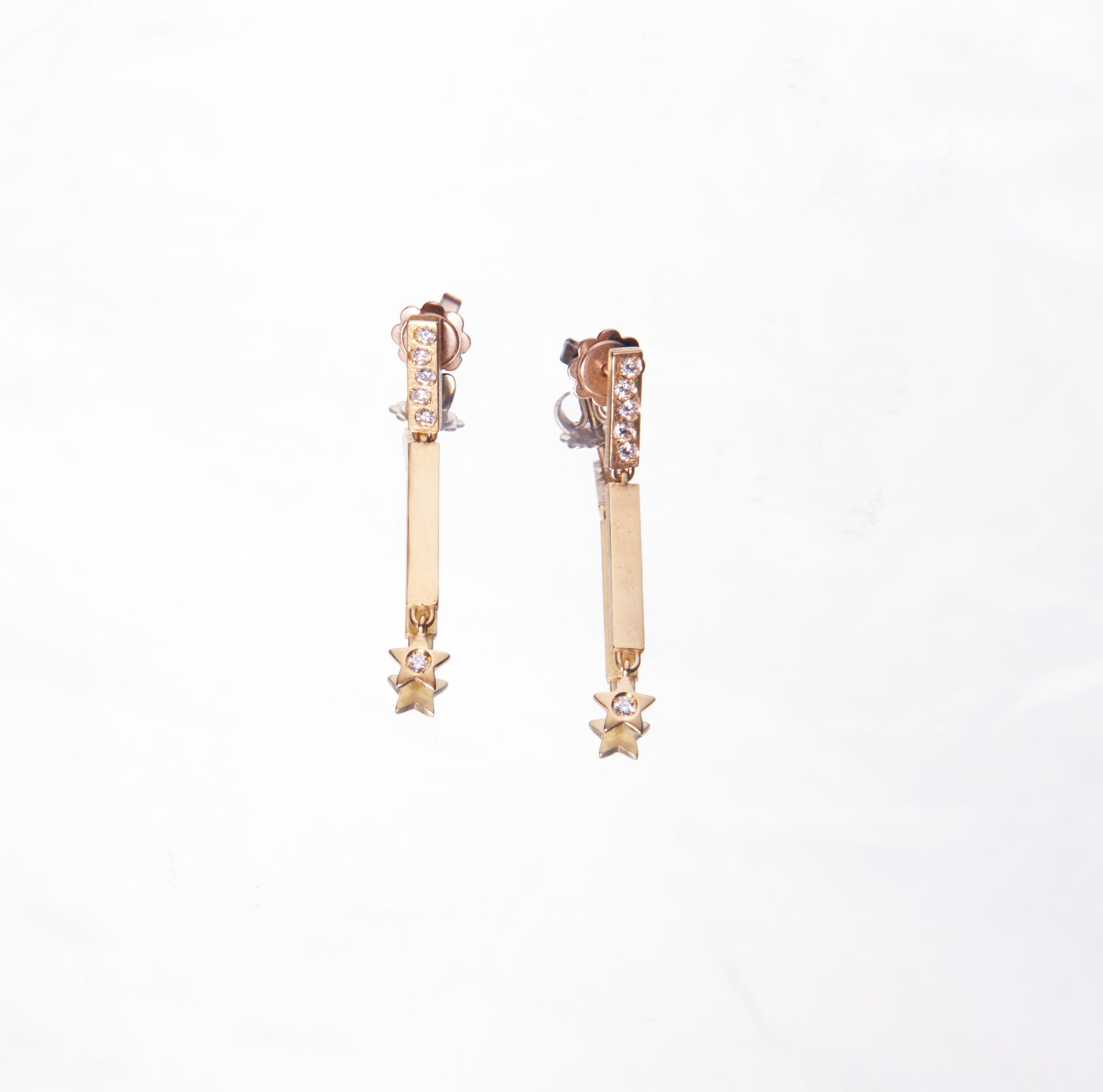 18K yellow gold with diamonds shooting star earrings by 11th house. Diamonds Made in Italy